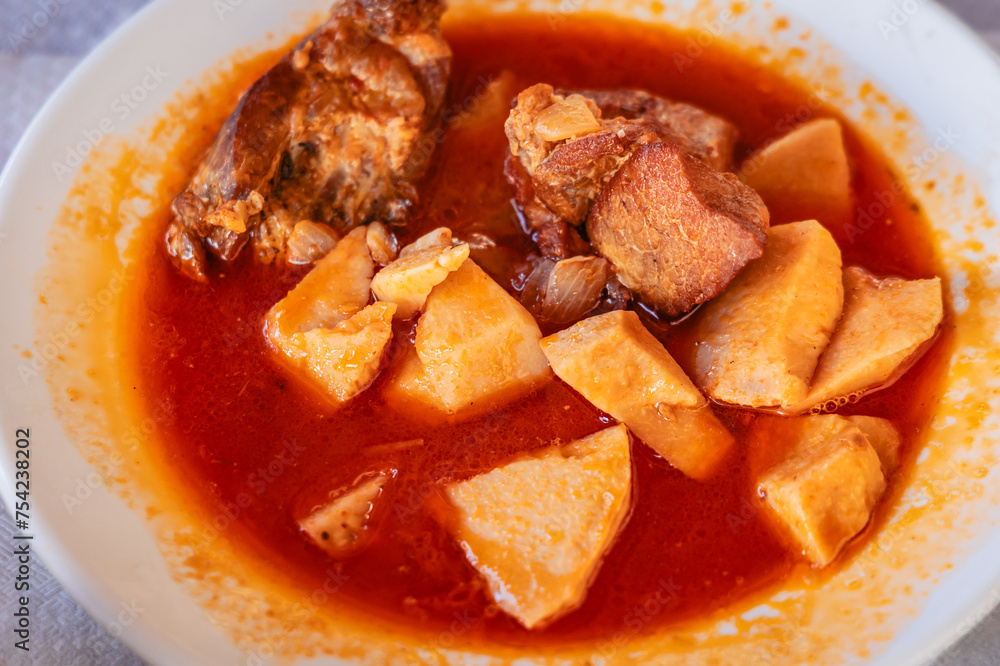 Kind of stew with Colocasia - Taro plant and meat in Cyprus island country Kind of stew with Colocasia - Taro plant and meat in Cyprus island country