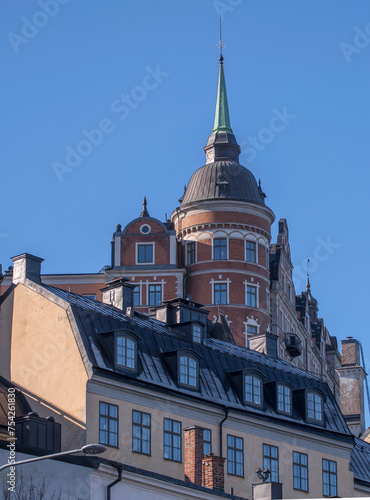 The house Laurinska huset with a brick tower in the district Mariaberget, a sunny winter day in Stockholm