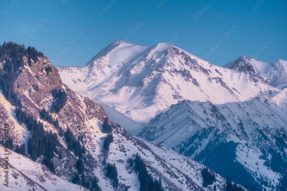 Beautiful mountain landscape with peaks of rocky mountains in Tien Shan, Alatau near Almaty city in Kazakhstan