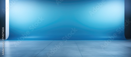 An empty room with a blue wall and floor, suitable for background use or displaying products. The room appears clean and minimalistic, with a contemporary design.