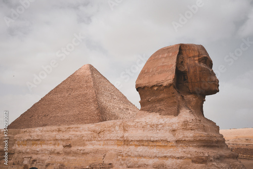The Great Sphinx of Giza in front of the Pyramids in Giza  Egypt