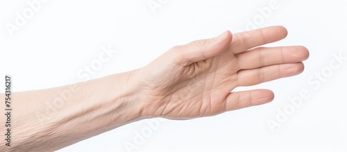 An old caucasian female hand with an opened palm gestures upwards, isolated against a white background. The hand is reaching out towards the sky. © TheWaterMeloonProjec