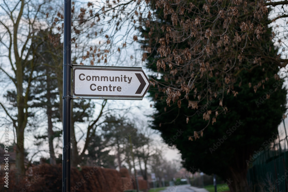 British road sign, directing drivers to a village Community Centre