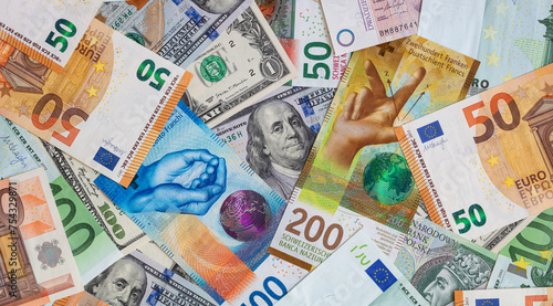 Closeup of  Swiss franc, US dollar, Euro, polish zloty banknotes  banknotes photo