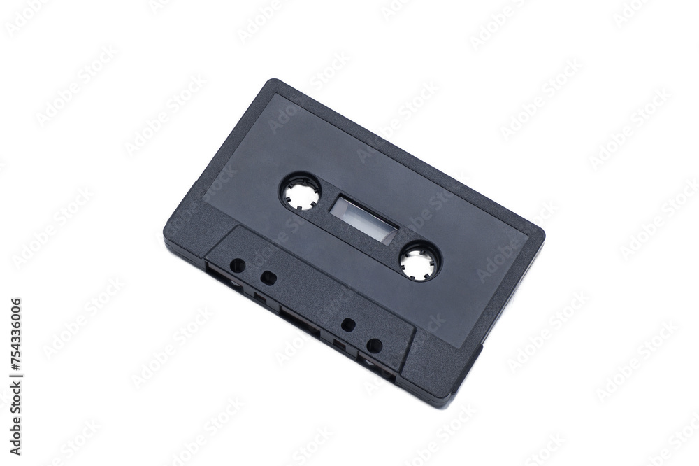 close up of vintage audio tape cassette blank black color and empty to add your own words and design. isolated on white background with clipping path top view