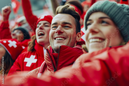 Swiss football soccer fans in a stadium supporting the national team  Nati 