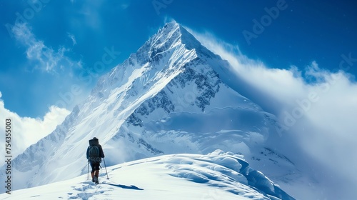 Man Standing on Snow Covered Mountain © utaem2022