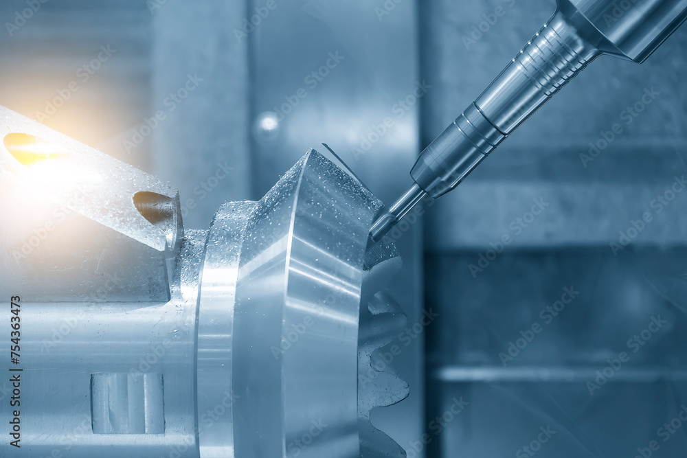 Naklejka premium The 5-axis CNC milling machine cutting the automotive part with solid ball end mill tool.