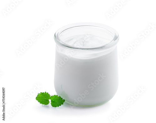 Fresh natural homemade organic yogurt in a glass jar isolated on white