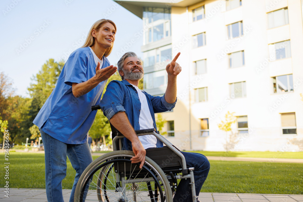 Empowering Mobility: Nurse and Patient Enjoying Outdoor Spaces Empowering Mobility: Nurse and Patient Enjoying Outdoor Spaces