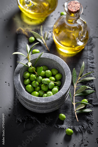 Green and ripe olives with ...