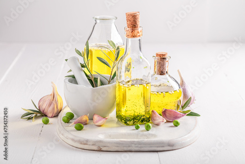 Delicious and healthy oil with garlic, oil, and herbs.