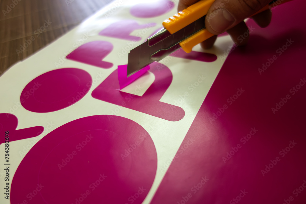 A cutting stencil.A selection of letters from vinyl film.Plotter cutting. A cutting stencil.A selection of letters from vinyl film.Plotter cutting.