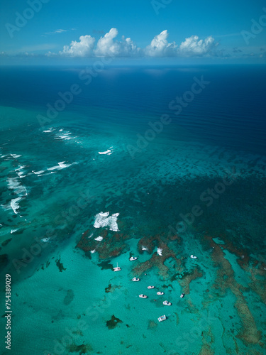 flying over the great barrier reef in the whitsundays, over a yacht, in Punta Cana, Dominican Republic