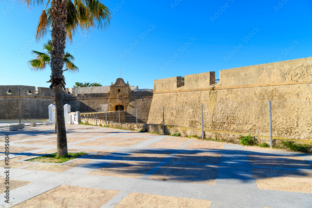 The entry gate to 17th century Castillo de Santa Catalina, or Castle of Santa Catalina, along the La Caleta beach area of Cadiz, Spain.	