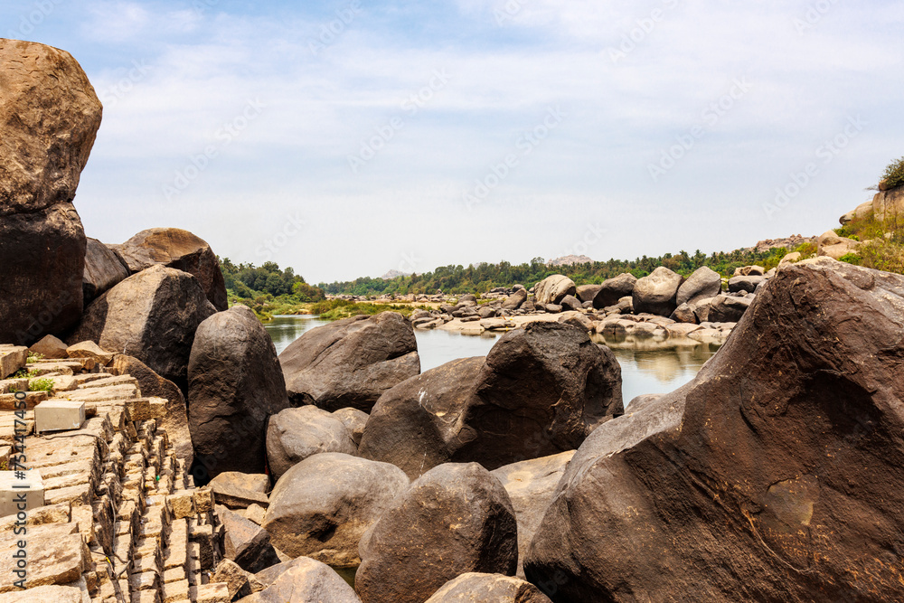 View at the Hampi landscape with big rocks and the Tungabhadra River, Hampi, Karnataka, India, Asia