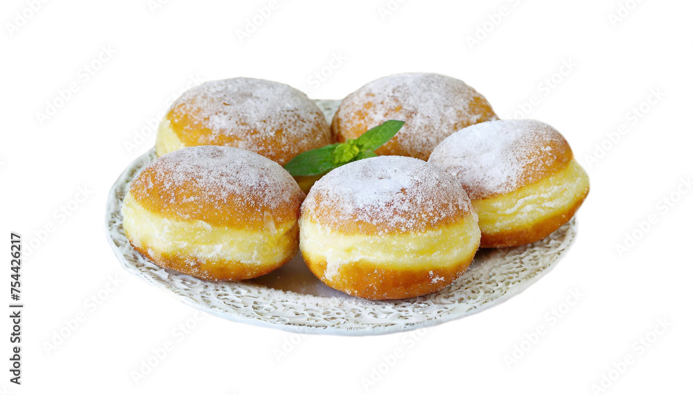 Powdered creme doughnuts stacked on a wooden dish.