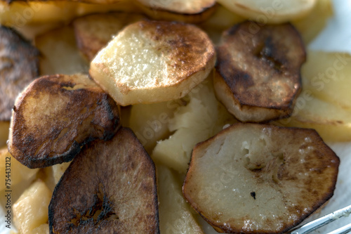 slightly burnt sliced potato