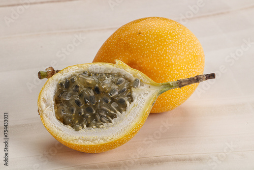 Yellow granadilla with cut half