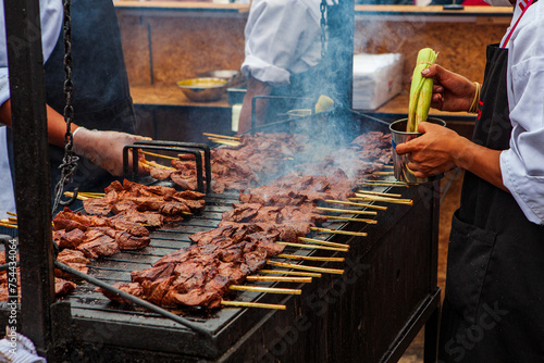 Peruvian Anticuchos are a popular street food in Peru, consisting of skewered and grilled marinated meat, typically beef heart, though other meats like chicken or beef 