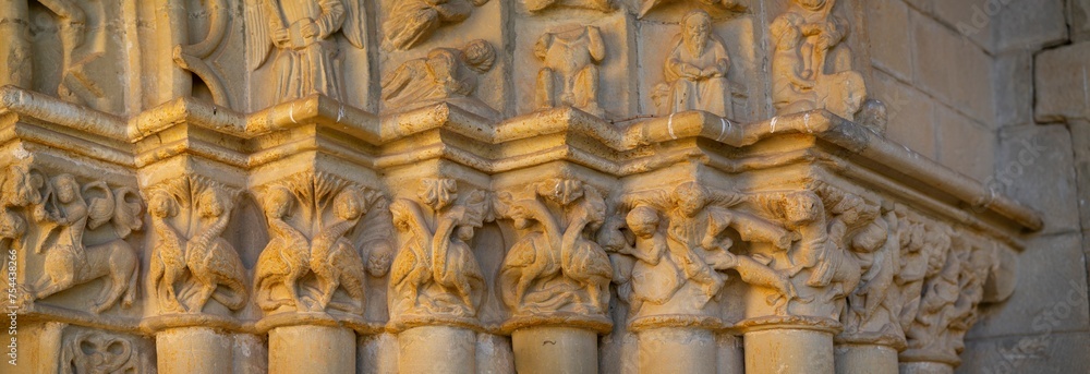 Romanesque portico in the church of Our Lady of the Assumption in the town of Tuesta. Valdegovia Valley. Alava. Basque Country. Spain. Europe