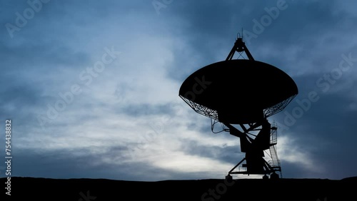 Radio telescope at dawn. Time apse photo
