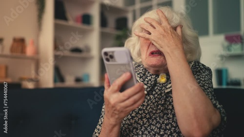 Comic senior woman saw an indecent content on cellphone app, feeling shocked photo