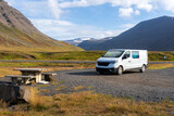 Campervan parked at resting area in Westfjords, Iceland. Adventure and road trip concept