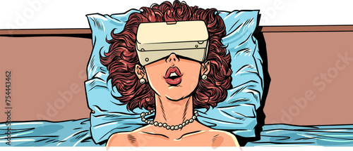 A woman lies in bed with a VR device. Opportunities to see the world in new colors with the help of technology. Instead of a healthy sleep, spending time on gadgets.