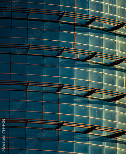 blue glass facade on sunny day