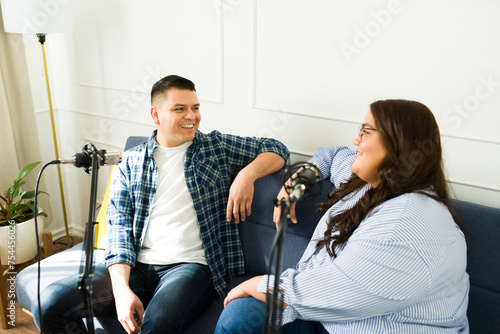 Latin people recording a podcast episode together