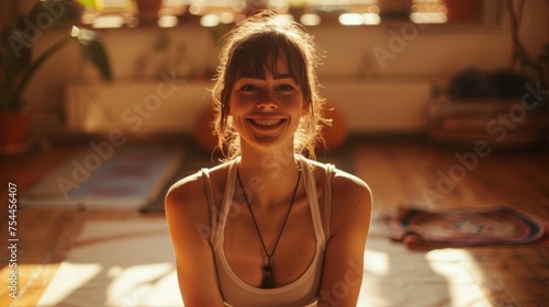 Smiling Yoga Trainer in Studio © Custom Media