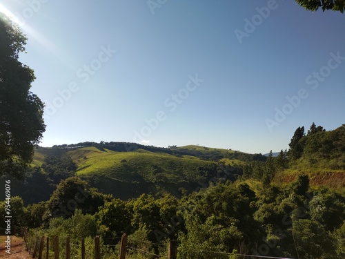 hill with blue sky in the background