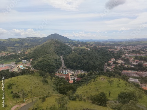 city landscape with nature around in the top of the hill