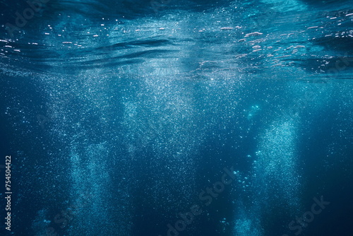 Air bubbles rise to water surface underwater in the Mediterranean sea, natural scene, France photo