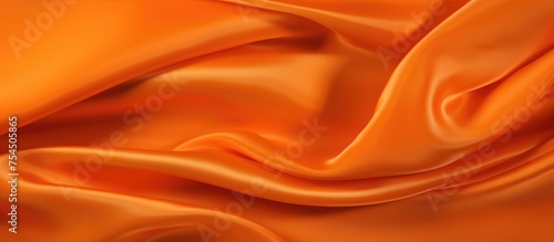This close-up view showcases the vibrant and textured surface of an orange fabric. The intricate weave pattern adds depth and visual interest to the fabrics bright color.