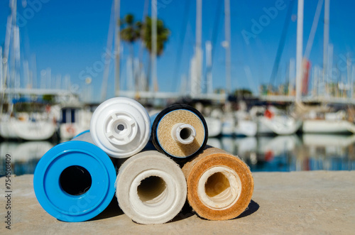 A set of used cartridges for water purification. Filters and membranes for the reverse osmosis system on the yacht