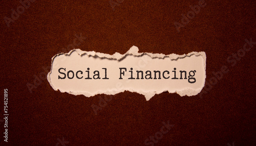 The text social finansing written on a lettered board photo