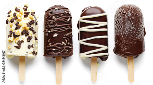 Four ice cream sticks with chocolate and white toppings