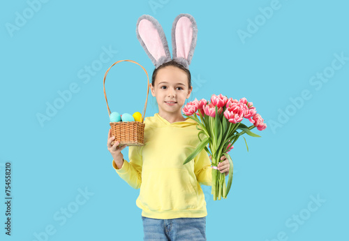 Happy young girl with bunny...