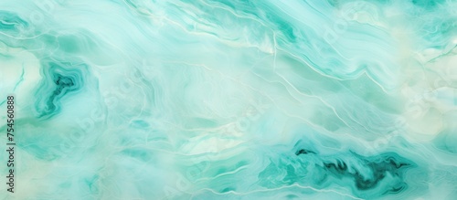 This image showcases a luxurious aqua green onyx marble stone texture mixed with white veins and patterns. The marble background adds elegance and sophistication to any design project.