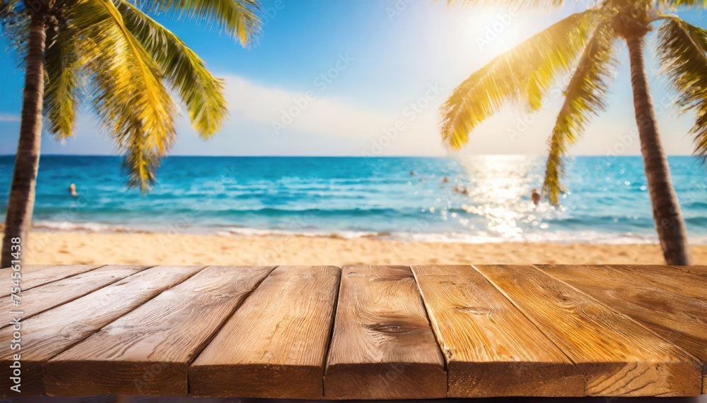 a wooden table on the beach, with the water next to it; vacation concept; summer holidays 