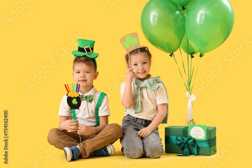 Cute kids with festive gree...
