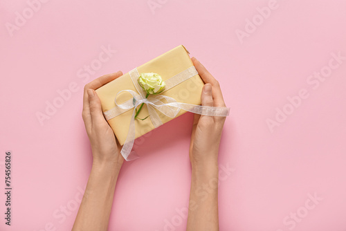 Hands holding elegant gift ...