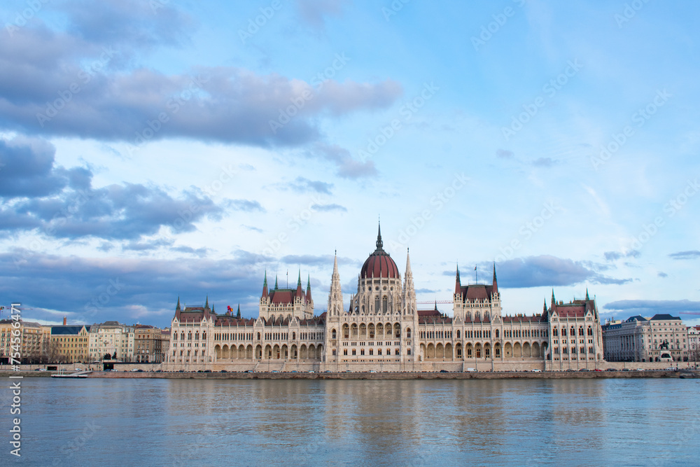 Beautiful sunset over Parliament Building and Danube River in Budapest, Hungary. 