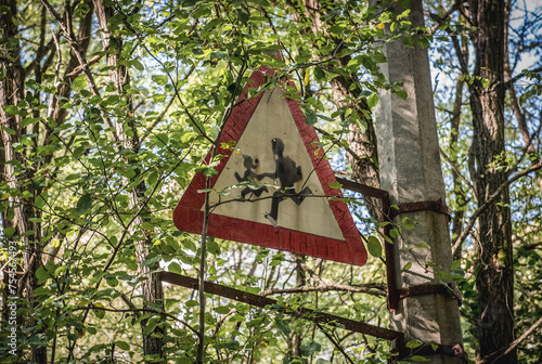 Children crossing sign in Pripyat ghost city in Chernobyl Exclusion Zone, Ukraine photo