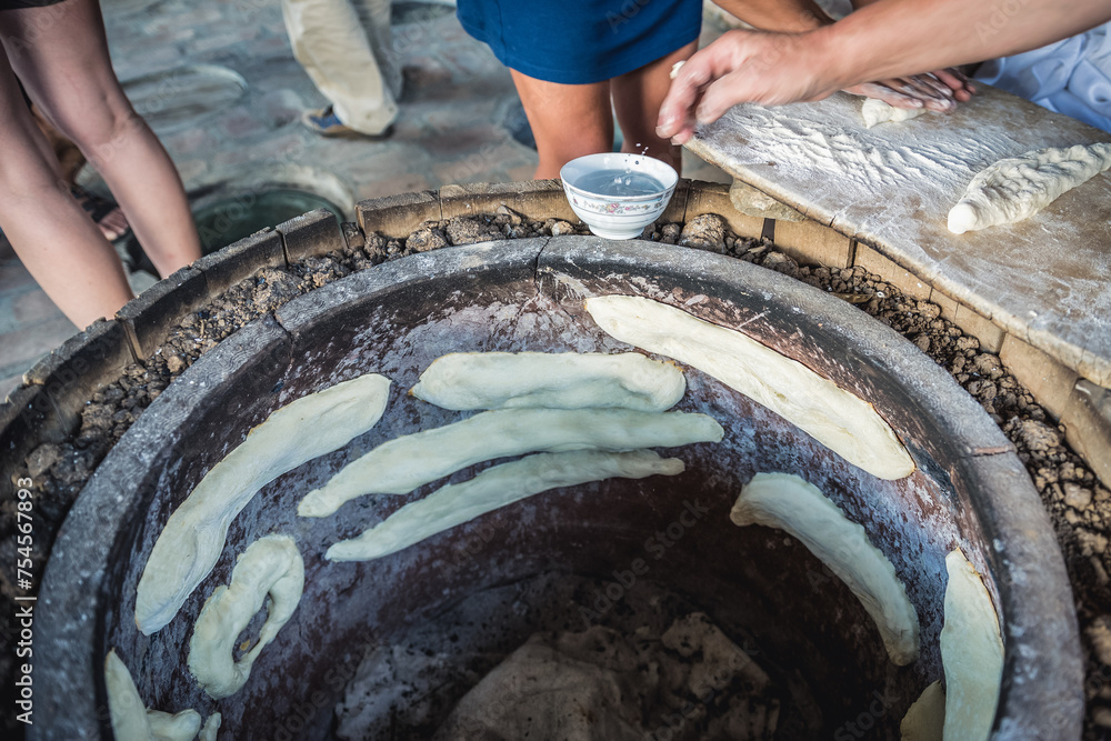 Traditional bakery called tone or torne or turne for baking a Georgian Shotis puri or Shoti bread in Napareuli village, Georgia