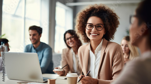 Businesswoman with her team during a meeting at the company's office