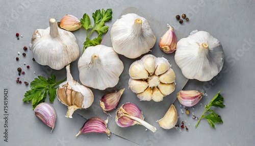 high quality photo . Whole and broken garlic bulbs, cook book idea for chopping vegetables photo