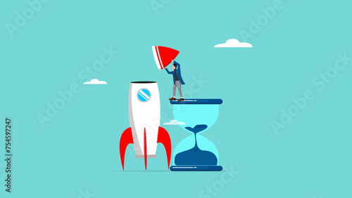 time to build a business startup, success steps in building a start-up business, journey to success in starting a business, businessman climbs the big hourglass and completes the rocket design